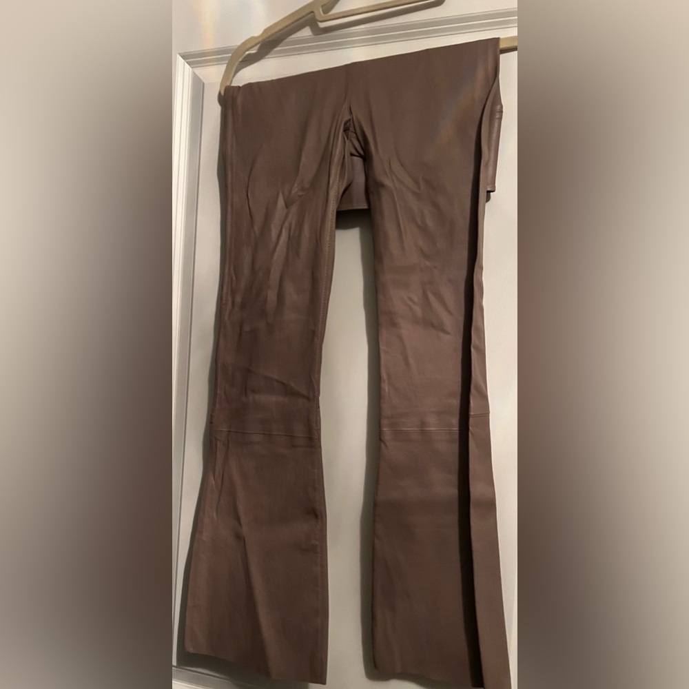 A cropped leather flair pants - 100% leather, have been shortened